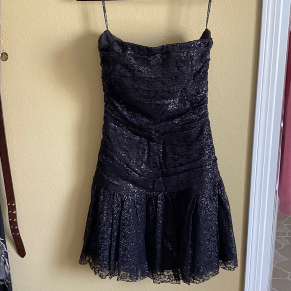 Black strapless party dress by Betsy Johnson